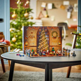 لگو Harry Potter 76438 - تقویم آدونت جادویی با ۲۴ محفظه، شامل فیگورهای هری پاتر و مینیمدلهای هاگوارتز.